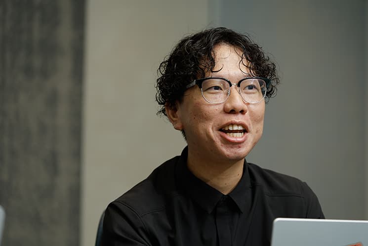 IT企業におけるハードウエア開発の難易度を話す高田信一さん