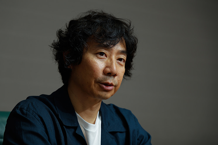 米Microsoftのシニアソフトウェアエンジニア・牛尾剛さん。AIが高速で出した答えを、自分で中身を理解しないまま承認する「ブラインドアプルーブ」の危険性を指摘し、AI時代ほど人間自身が内容を深く理解することが重要だと語る