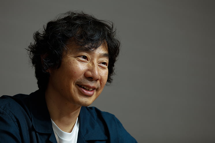 米Microsoftのシニアソフトウェアエンジニア・牛尾剛さん。身近な同僚がレイオフの対象となり、選定基準も見えない中で「次は俺やろ」と強い恐怖を感じた当時の心境について語る